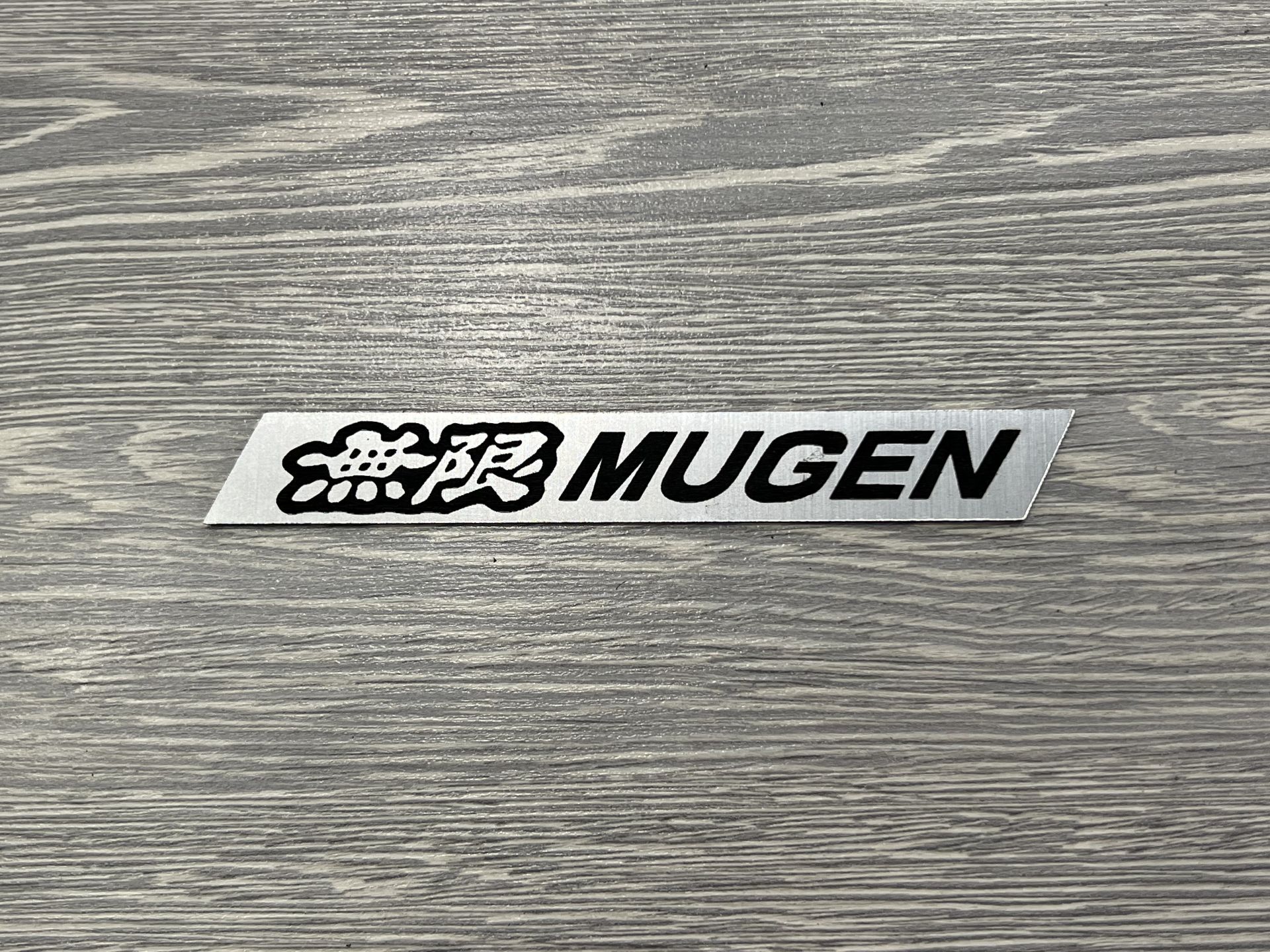 Емблема Mugen для Honda ABS пластик (14см)