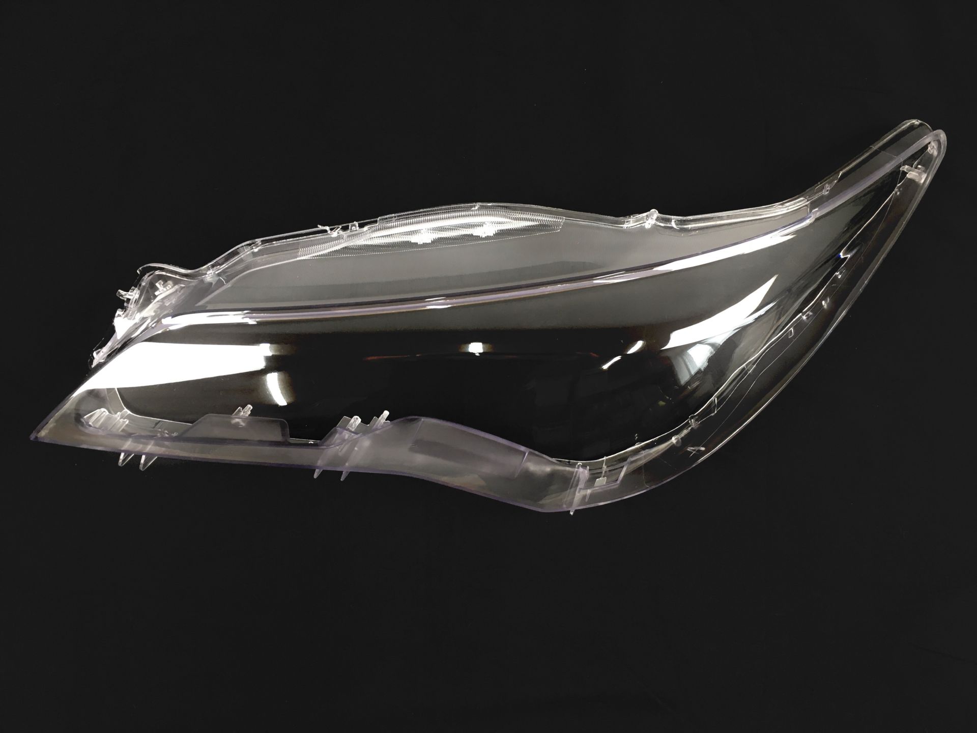 Скло фари Toyta Camry USA 55 / 60 2015-2017 ліве